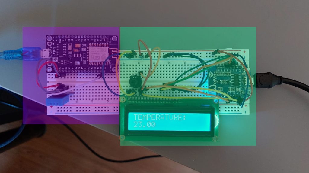 Breadboard with two microcontrollers and a display